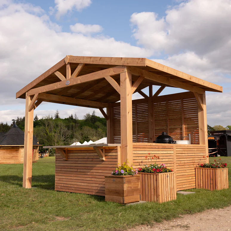Planed Larch Apex Pergola with Cedar Featheredge Roof – With Overhang Design