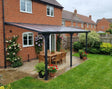 4.35m x 3m Wall Mounted Pergola with Retractable Canopy, Aluminium Frame & Polycarbonate Roof – Grey Patio Cover